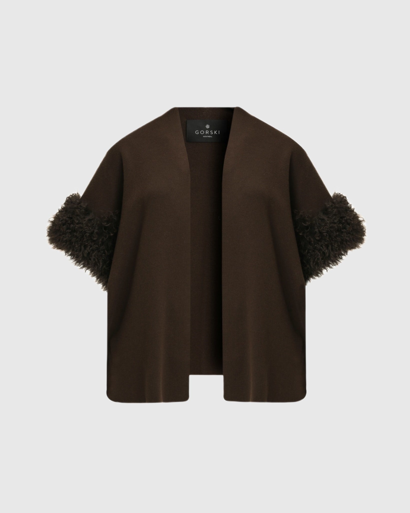 Gilet en tricot avec garniture en peau d'agneau mongole sélectionnée (Tg)