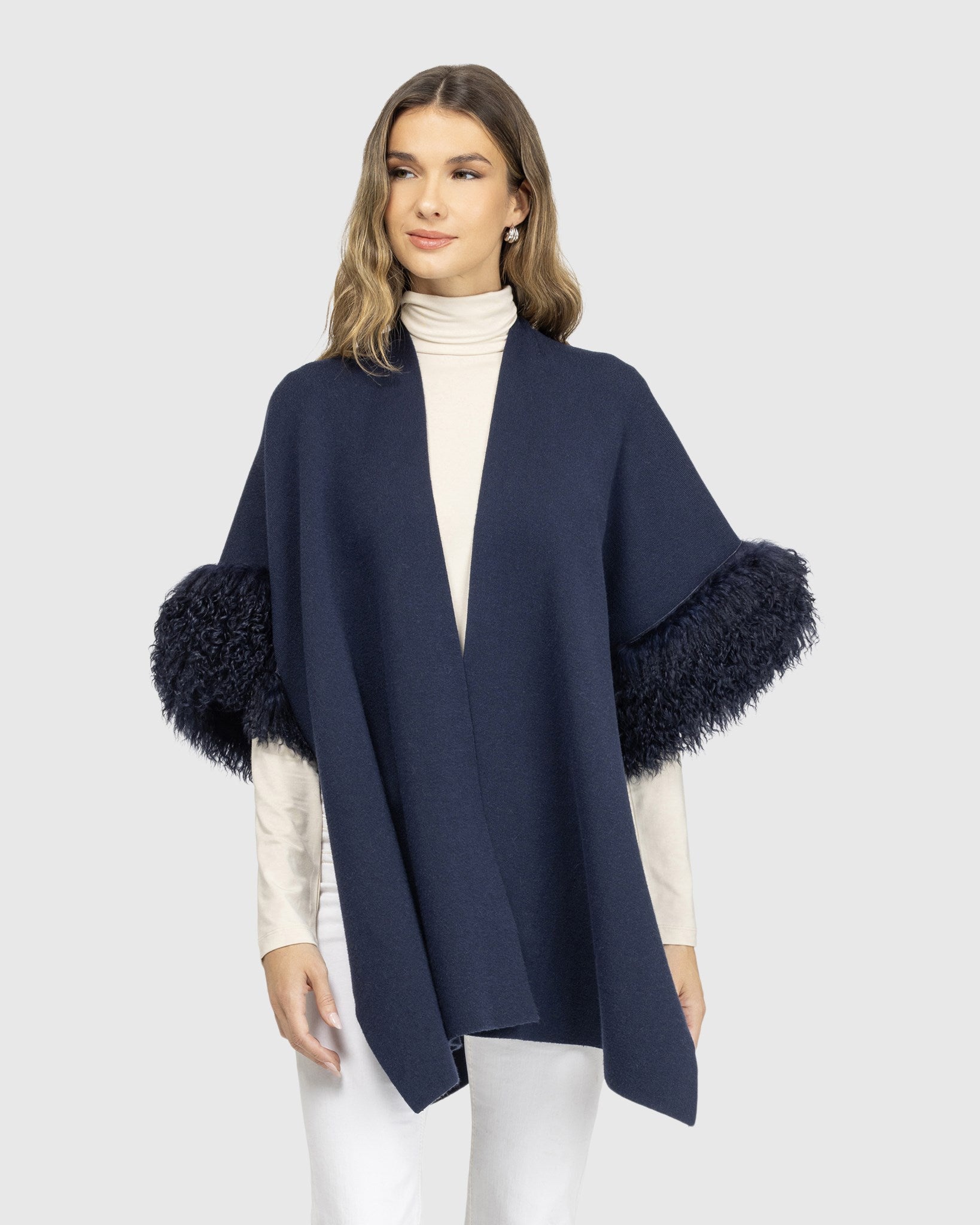 Gilet en tricot avec garniture en peau d'agneau mongole sélectionnée (Tg)
