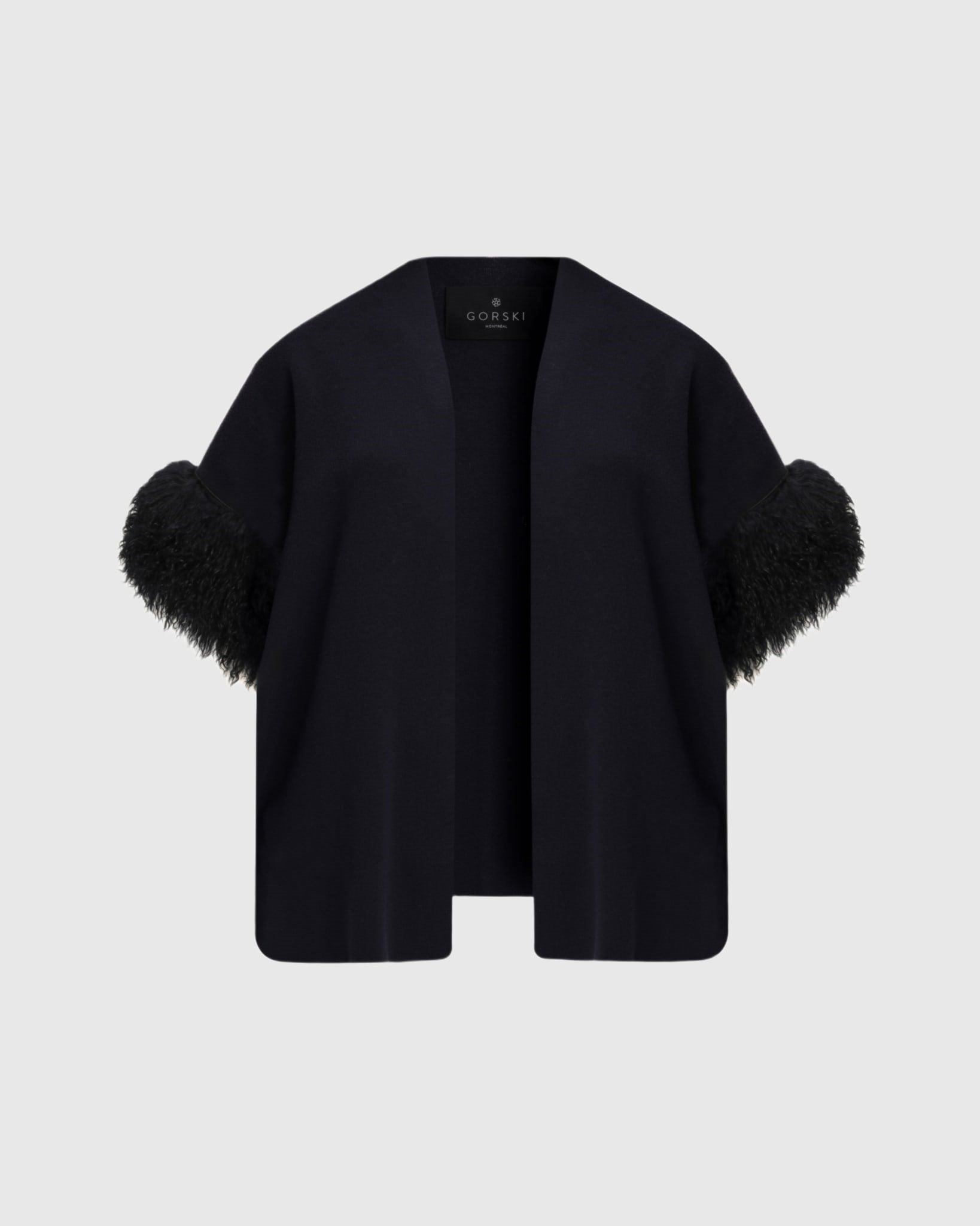 Gilet en tricot avec garniture en peau d'agneau mongole sélectionnée (Tg)