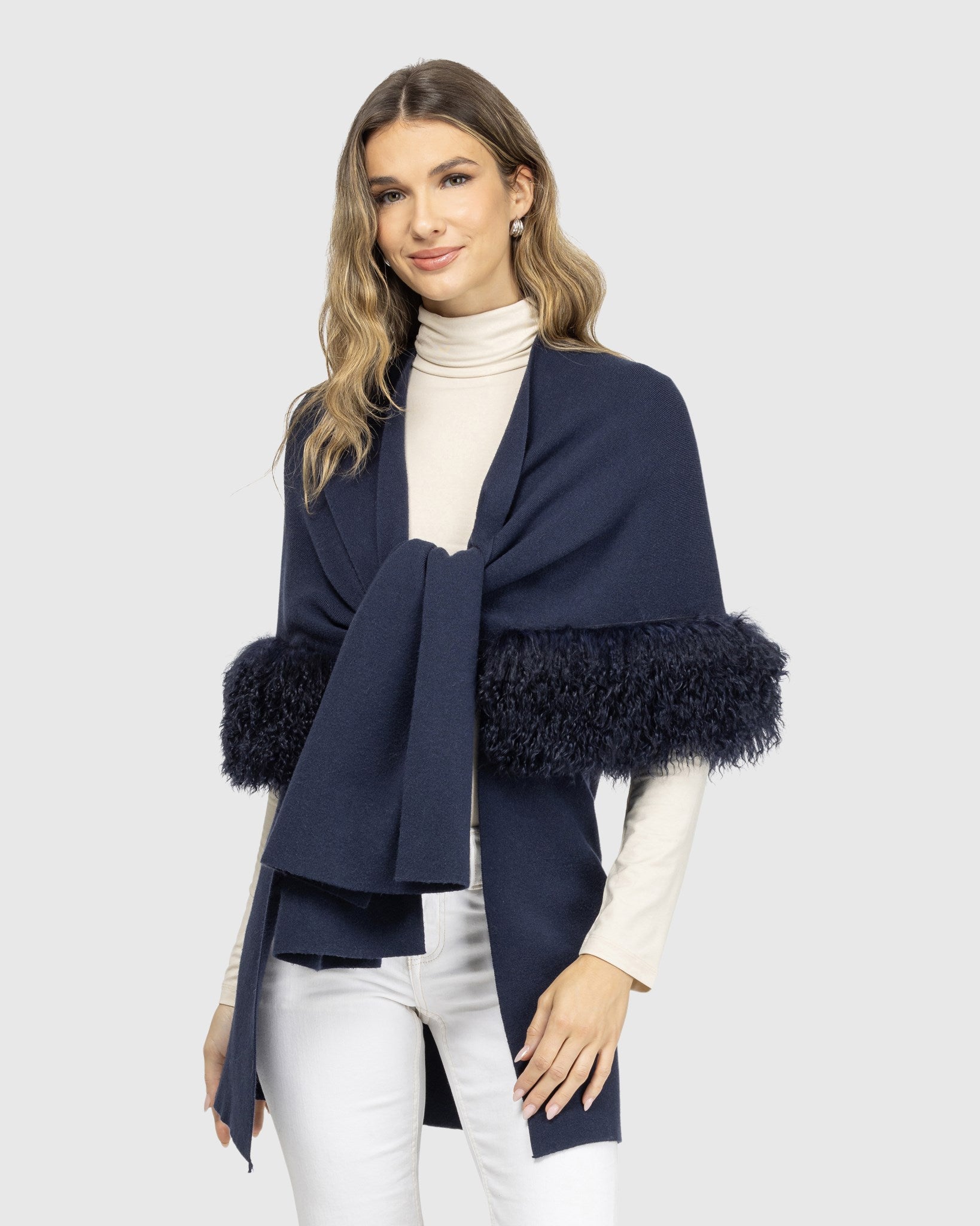 Gilet en tricot avec garniture en peau d'agneau mongole sélectionnée (Tg)